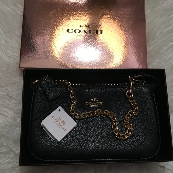 Coach Handbags - Coach leather wristlet EUC
